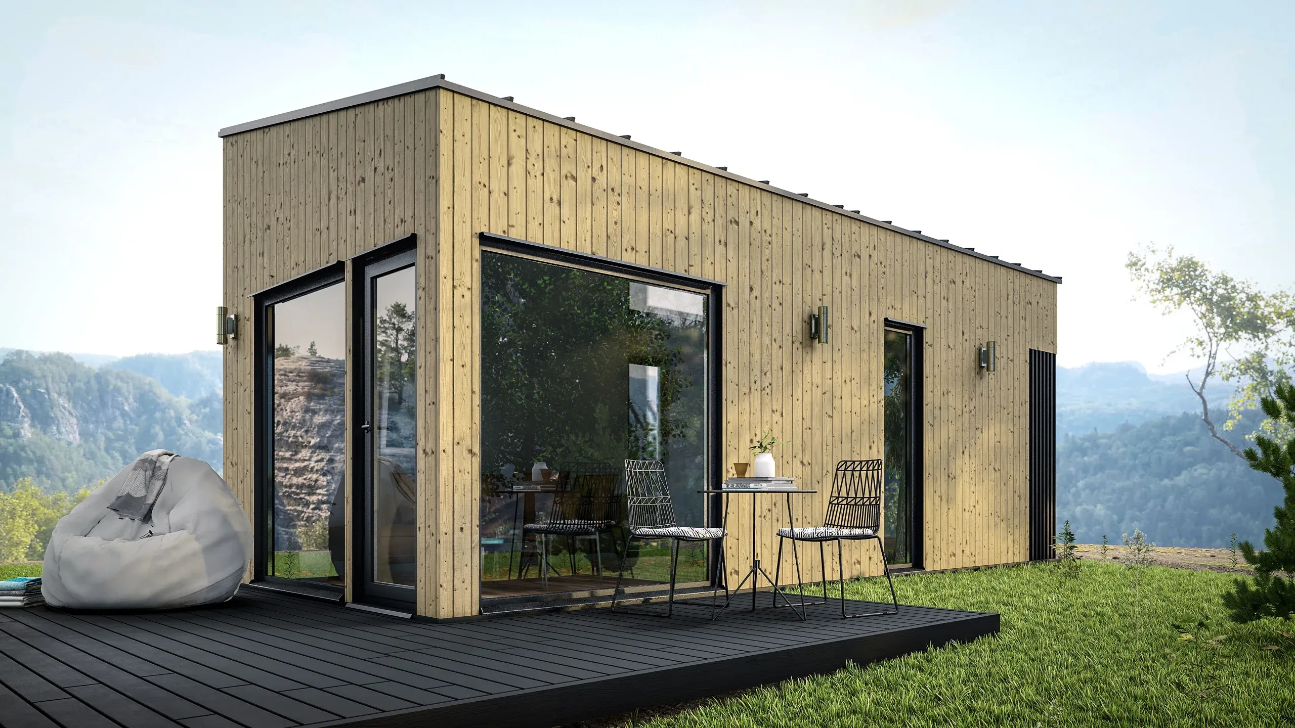 Modulaire woning van Bouw Art met een lichte houten gevel in een berglandschap